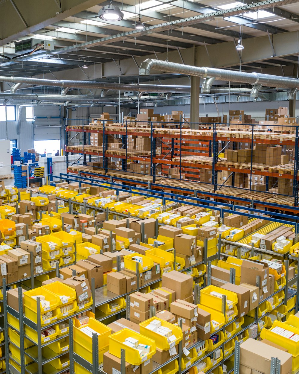 Warehouse racks filled with packaged goods ready for handling.